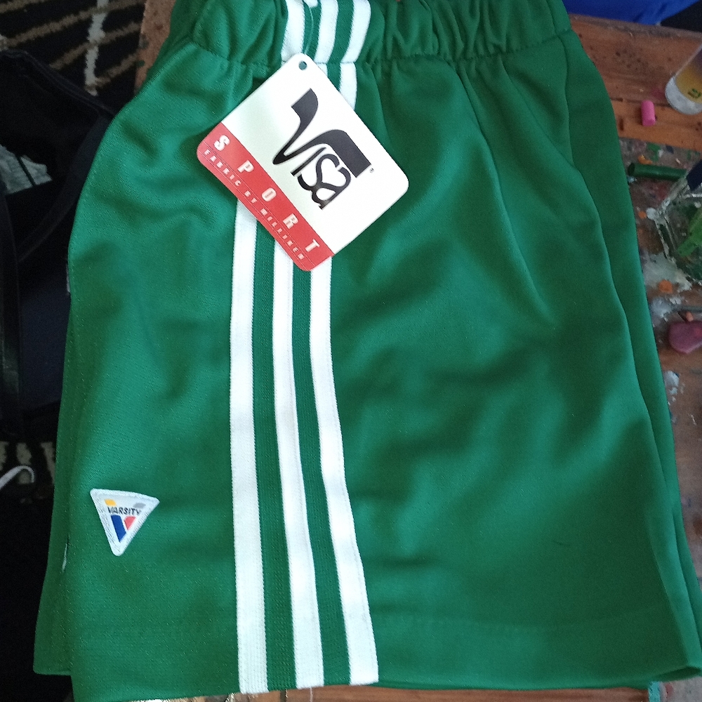 Kids soccer shorts size small and xs 4 of each color red green and blue will